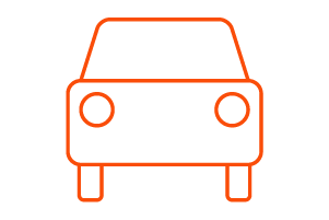 Simple orange outline icon of a car viewed from the front, with two circular headlights and two visible wheels, on a light gray background—ideal for illustrating transfer pricing or country by country reporting concepts.